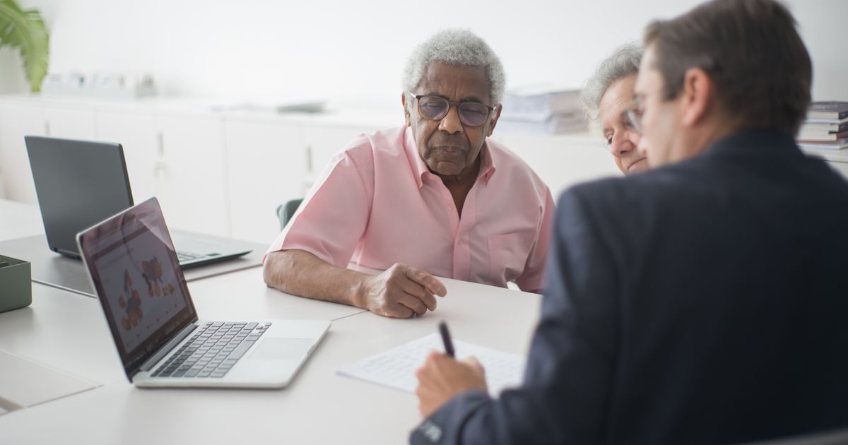 Senior couple reviewing Medicare options with an advisor